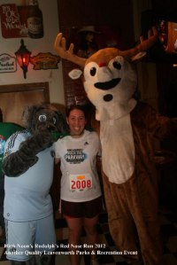 Receiving my medal with Blue from KC Sporting and Rudolph himself! I hope Rudolph learns to eat a healthy breakfast before delivering presents with Santa!